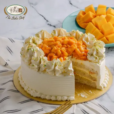 Our Fresh Mango Cake is loaded with juicy, ripe mango chunks and layered with light cream. It's a seasonal best-seller that truly captures the taste of summer.