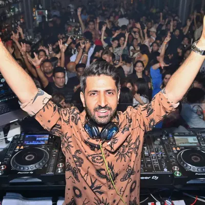 Arms wide open, embracing the incredible energy from a packed house at Babylon, Hyderabad. Club gigs like this are special because the connection with the audience is so immediate and powerful.