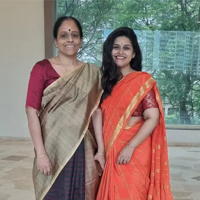 With my Guru, Smt. Revathi Srinivasraghavan. The knowledge and values she has imparted to me are the foundation of my own teaching. This relationship is at the heart of the Guru-Shishya tradition I follow in my classes.
