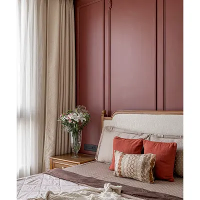 A closer look at the bedroom we designed. The rich burgundy accent wall with classic molding pairs beautifully with the custom bed and side table I built. The goal was to create a space that feels both grand and comfortable.