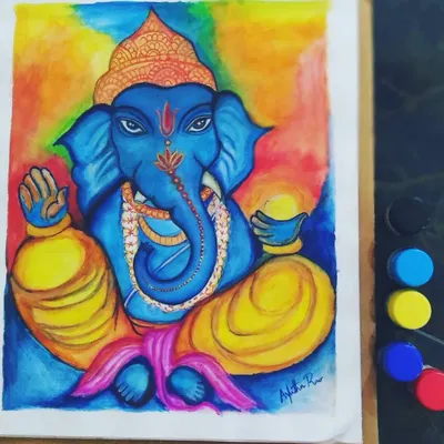 Here is my painting of Lord Ganesha, the remover of obstacles. I depicted him in a serene, meditative pose using a vibrant blue for his form, set against a warm, multi-colored aura to represent his divine and benevolent energy.