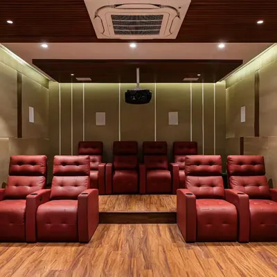 This private home theater is the ultimate space for sports and movie lovers. With two tiers of comfortable leather recliners and professionally installed speakers, it offers an immersive experience right at home.