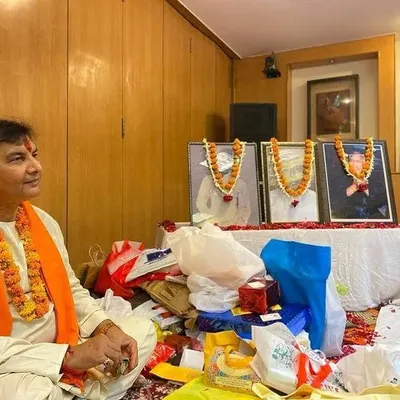 A personal moment from our Guru Purnima ceremony in 2022. I am sitting before the portraits of my revered gurus, offering my respects. This day is a beautiful reminder of the knowledge and blessings they have bestowed upon me.