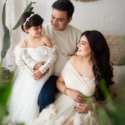 Squad goals. This beautiful family portrait with their daughter is just perfect. I love capturing the sweet interactions as they await their new arrival.