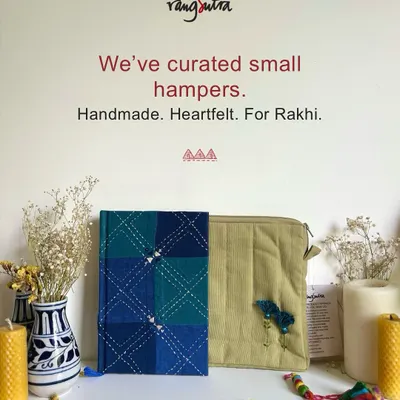 We’ve curated small hampers that are handmade and heartfelt, especially for Rakhi. This set features a fabric-covered journal and a quilted pouch, perfect for holding memories and everyday essentials.