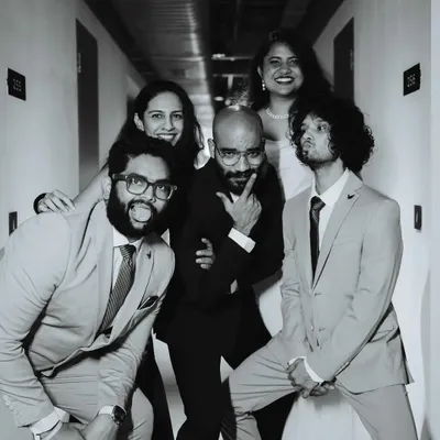 Unfiltered, unscripted, unforgettable. A fun, candid black and white photo of me and my photography team, the crew behind the lens.