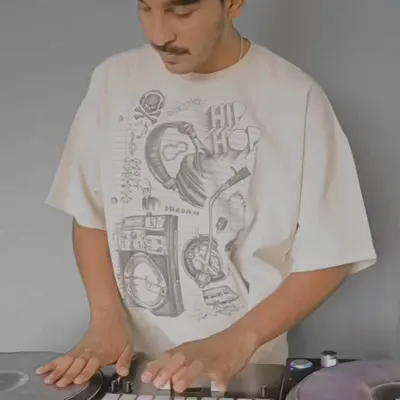 A shot of me at the decks for the "On the Record" event at the UV Hangar. This was a cool corporate gig where I got to showcase my turntablism skills in a unique setting.