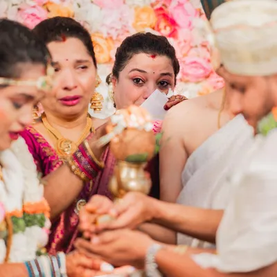 A touching moment between a mother and daughter during the wedding ceremony. My makeup is designed to be waterproof and hold up through all the emotions of the day.