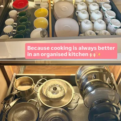 This is what we mean by creating a system. The top drawer holds everyday crockery, while the bottom is for steel pots and pans. Each item has a home, making cleanup and cooking a breeze.