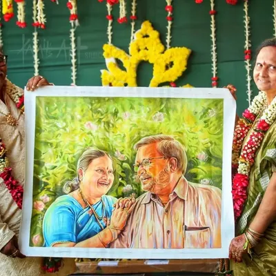 This happy couple is celebrating their anniversary with a custom oil painting I created for them, a gift from their son to cherish their bond.