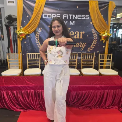 Hosting a corporate anniversary requires a blend of professionalism and fun. Here I am, ready to kick off the celebration for Core Fitness Gym's first anniversary, ensuring the event is both memorable and reflects the brand's energetic spirit.