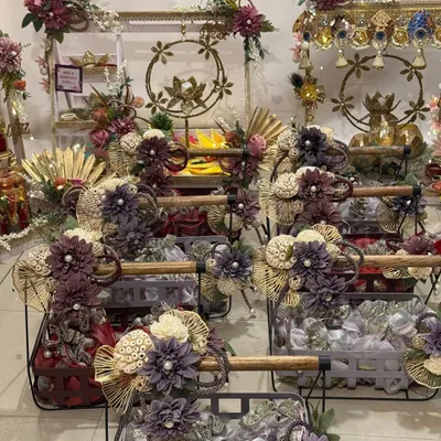 For Diwali, I love creating an atmosphere of abundance and beauty. This is a look at my workshop filled with custom bulk orders, featuring floral baskets and decorated hampers, each ready to bring joy to a new home.