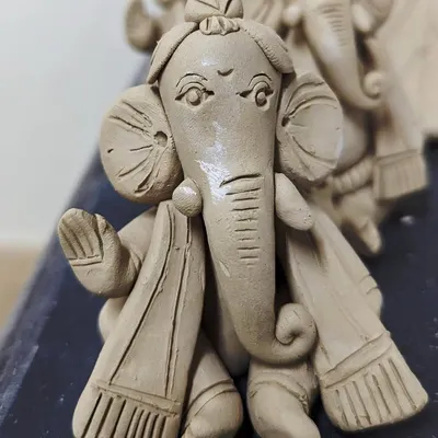 A charming Ganesha idol made by a participant in one of my workshops. I guide you through hand-building techniques to create your very own festive sculpture.