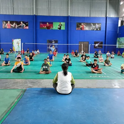 A view of our yoga session from the instructor's perspective. We guide players through poses that specifically benefit a badminton player's range of motion and core strength.