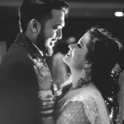 A classic black and white candid shot. The genuine smiles and eye contact between Ketki and Paras show the pure joy and love that I strive to capture in my photography.