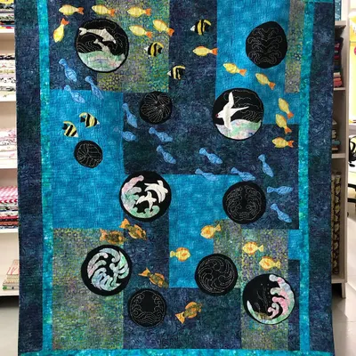 This award-winning "Sea Quilt" is a true work of art, using appliqué and sashiko techniques to create an underwater scene.