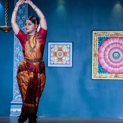 A powerful stance from my performance at the Mumbai Natyanjali festival, an offering to Lord Nataraja, the cosmic dancer. The blue background and artwork created a beautiful setting for this devotional piece.