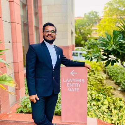 I am passionate about my work and committed to being the hardest worker in the room. This photo was taken at the Lawyers Entry Gate of the Delhi High Court, a place I consider my second home.