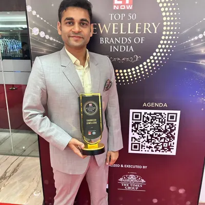 Our director proudly accepting the "Top 50 Jewellery Brands of India" award from ET Now, a moment that reflects our entire team's commitment to excellence.