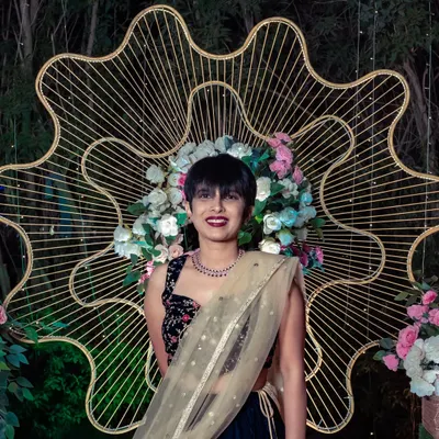 A solo picture from an anniversary party I hosted in Pune. Whether the event is large or small, formal or casual, I dress for the occasion to blend in seamlessly with the atmosphere of your celebration.