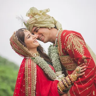 A moment of pure love and laughter right after the Varmala. We plan for these candid, joyful exchanges that you'll look back on and smile.