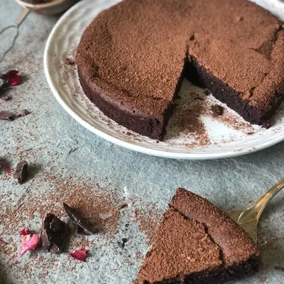 A slice of gluten-free goodness, because you shouldn't have to wait for a cheat day to enjoy cake. This flourless dark chocolate cake can also be made with jaggery.