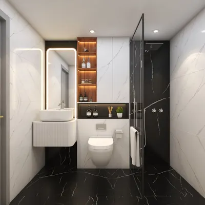 A classic and bold bathroom design. The contrast of black and white marble tiles creates a dramatic effect. The floating vanity and backlit mirror are modern touches that also save space.