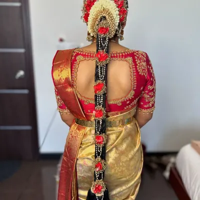 A detailed view of a classic South Indian bridal braid I created for Prerana. The combination of fresh flowers and traditional hair jewelry makes for a truly showstopping look.