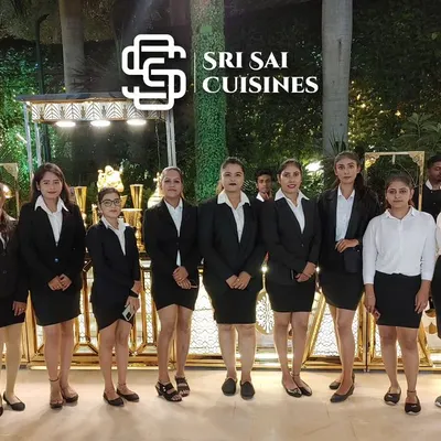 This is our core team of service hostesses, dressed in classic and professional black and white formal attire. Their coordinated look and poised presence are ideal for a wide range of events, from corporate functions to elegant wedding receptions, ensuring a high standard of service.