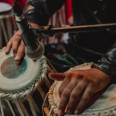 A close look at my hands on the tabla. For me, every touch and every beat is a form of expression. This is the heart of my craft, where years of practice and dedication come together to create rhythm.