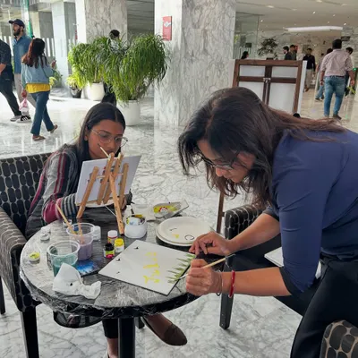 One of my favorite parts of any workshop is connecting with you one-on-one. Here I am helping a participant with her technique, ensuring everyone feels supported and confident, no matter their skill level.