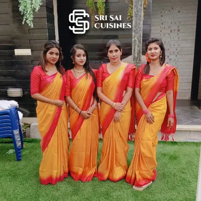 The right attire enhances the theme of any traditional event. Our hostesses are shown here in vibrant yellow and red sarees, a classic and auspicious color combination perfect for South Indian weddings, religious ceremonies, and festive gatherings.