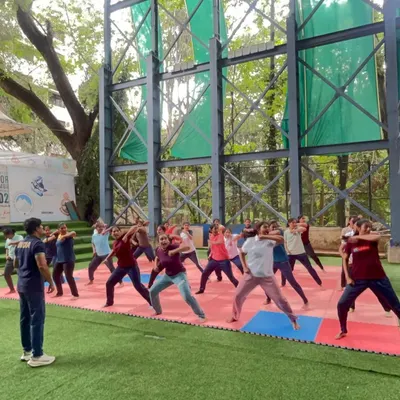 An instructor leads a group of women through foundational stance and movement drills. Mastering these basics is the first step toward developing balance and stability, which are crucial for any self-defense action.