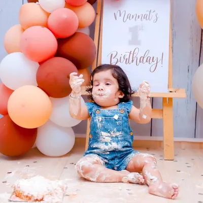The aftermath of a successful cake smash! We love capturing the pure, messy joy as a little one celebrates their first birthday in the sweetest way possible.