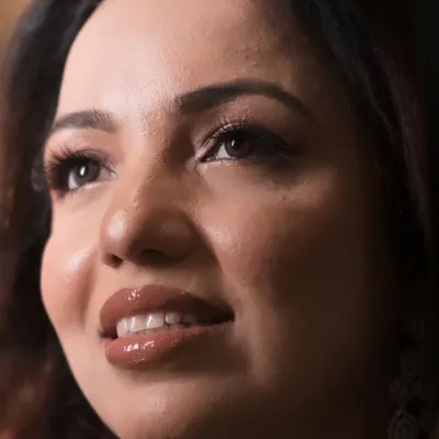 A close-up showcasing my signature dewy finish. Notice the natural skin texture, glossy lip, and the overall radiant glow. This is what I mean by enhancing, not hiding.