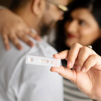 Two pink lines, and a lifetime of happiness ahead. This shot captures the very beginning of the journey, focusing on the positive pregnancy test that changed everything. It's a powerful and emotional memory to hold onto.