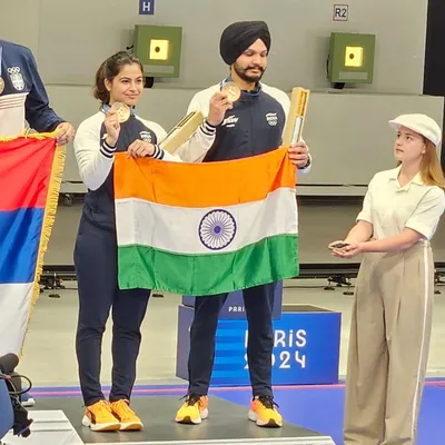A moment of immense national pride. My students Manu Bhaker and Sarabjot Singh on the podium at the Paris 2024 Olympics, holding the Indian flag after winning the bronze medal. This is the result of years of relentless effort and world class preparation.