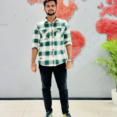 In front of the global network map at the BDO office. My experience is backed by a global standard of excellence, which I apply when offering small business tax advice and strategic planning.