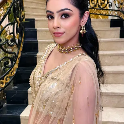 A beautiful soft glam look for an evening event. I focused on creating a flawless base and a classic winged liner to complement her elegant gold saree.
