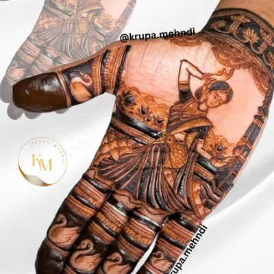 A traditional yet trendy design featuring a classical dancer figure. This is a beautiful way to celebrate our culture through mehndi art.