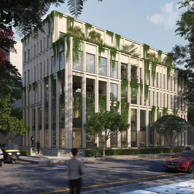 A render for an upcoming commercial project in Koramangala, featuring a limestone facade with integrated planters that allow greenery to cascade down the building. This concept explores how architecture can merge with the natural landscape in an urban context.