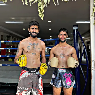 In the ring with a fellow fighter. We constantly push each other to stay sharp and ready.
