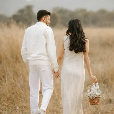 This is the beginning of a new chapter. I captured this moment for Sejal and Nikul in a quiet field in Lonavala as they walked hand in hand, dreaming of the future. It’s these unscripted, in-between moments that tell the most beautiful stories.