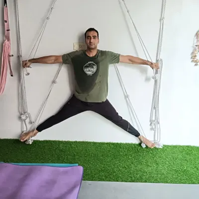 Using the Iyengar yoga ropes for a deep inner thigh and hip stretch. This is a great way to work on flexibility with support.