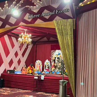 A beautifully decorated stage for a religious or cultural event, showing our versatility in handling different types of celebrations.