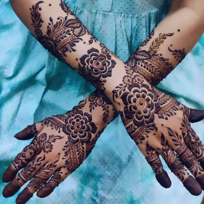 A bold and beautiful floral design. The dark, rich stain makes the flowers and leaves stand out dramatically.