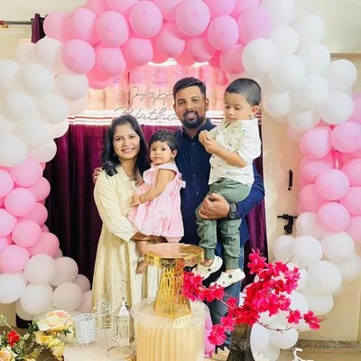 A complete family picture from my daughter Aarya's birthday celebration. My husband, my two kids, and me. My world in one frame.