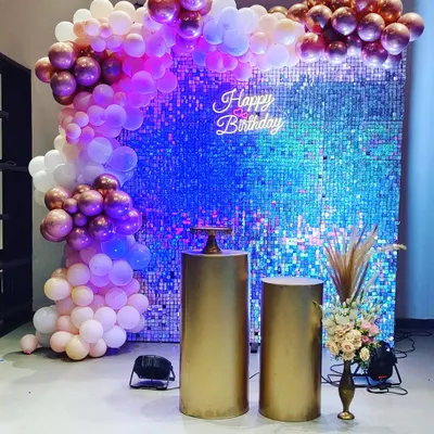 A popular choice for milestone birthdays and elegant events. This setup features a dazzling sequin wall, a custom neon sign, and a beautiful organic balloon garland in rose gold and white.