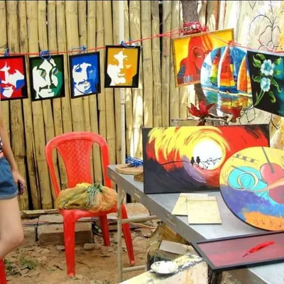 This picture is from 11 years ago, at my very first exhibition stall in Bangalore. I had no idea then that this passion would turn into a career of painting over 85 walls for clients like OnePlus and Wipro.