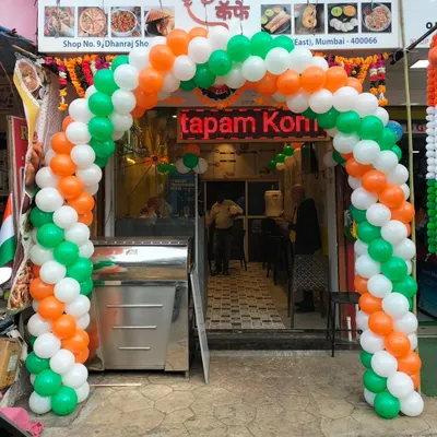 A tricolor balloon arch at the entrance of a restaurant for Republic Day. This is a classic and effective way for any business to participate in national celebrations.